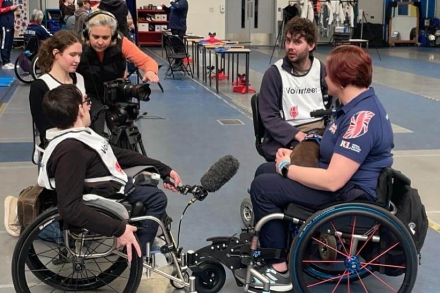 Students interview two para athletes