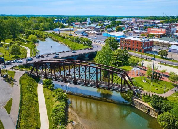 A bridge spanning a river in a town in rural Ohio